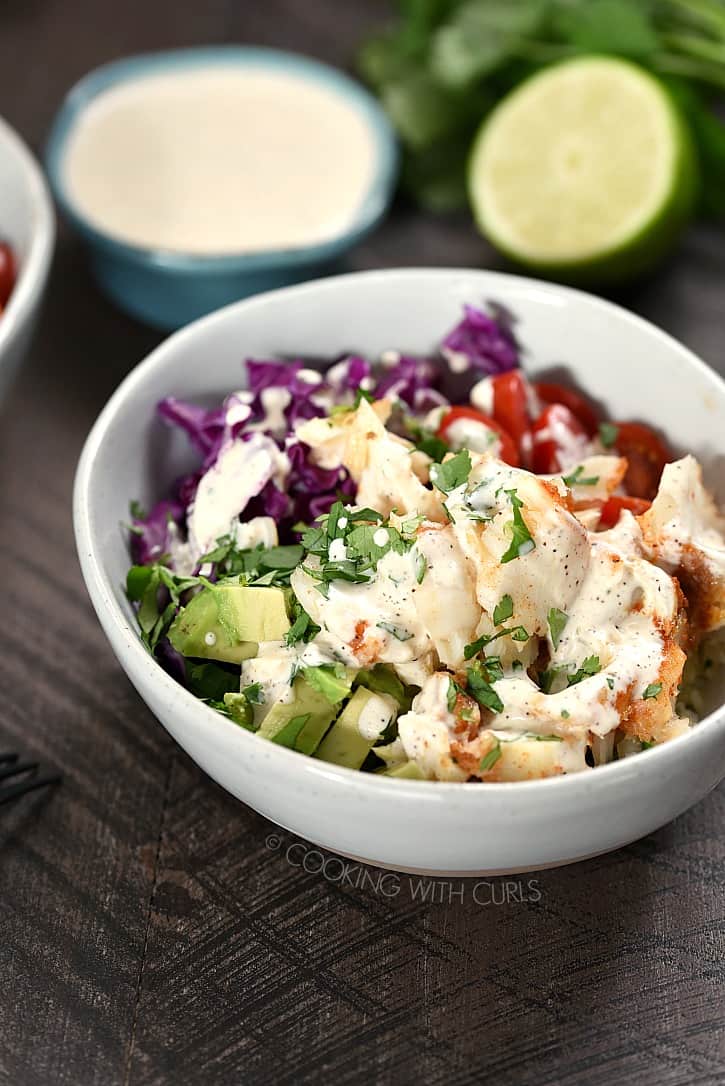 If you are looking for a healthy and delicious meal the whole family will love, look no further than these Fish Taco Bowls! cookingwithcurls.com