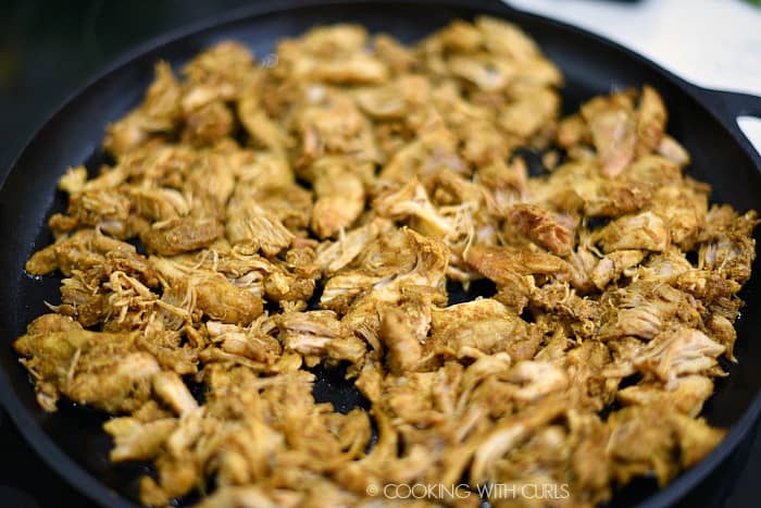 Sear the spiced chicken in a large skillet to remove the excess moisture cookingwithcurls.com