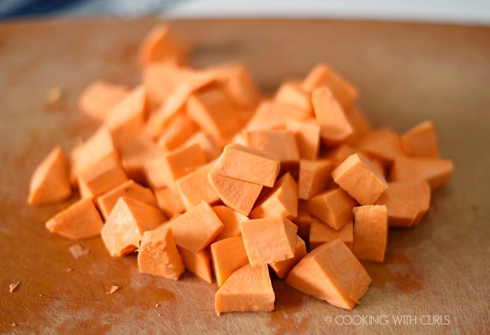 Sweet Potatoes chopped on a cutting board cookingwithcurls.com