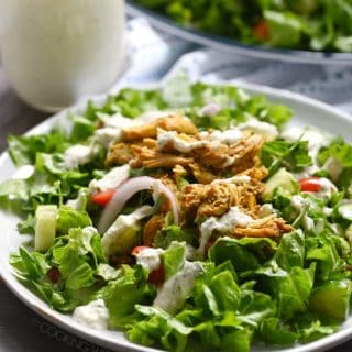 This Chicken Shawarma Salad with dairy-free Tzatziki Dressing has all of the flavors from a Mediterranean restaurant, and it is Whole30 and Paleo compliant as well!! cookingwithcurls.com