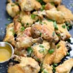 These Garlic Parmesan Chicken Wings are crazy simple to prepare and the flavor is amazing! cookingwithcurls.com