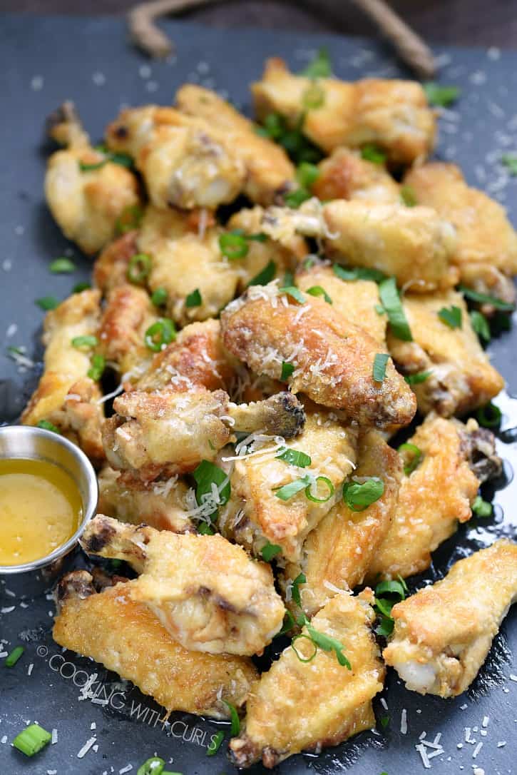 These Garlic Parmesan Chicken Wings are crazy simple to prepare and the flavor is amazing! cookingwithcurls.com