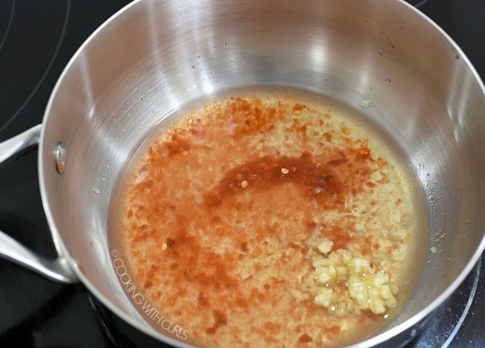 Reduce the chili lime sauce in a saucepan 
