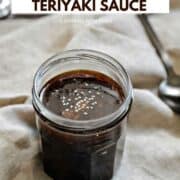 A small jar of sugar free teriyaki sauce topped with sesame seeds and title graphic across the top.