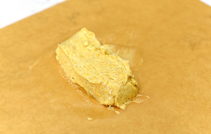 Form a log with the compound butter on a piece of parchment paper 