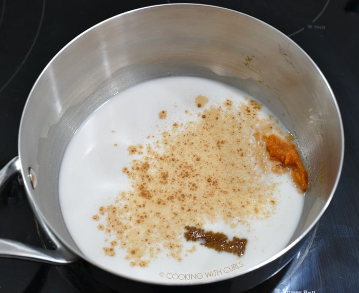 Mix the milk, pumpkin, spices and sweetener together in a saucepan 