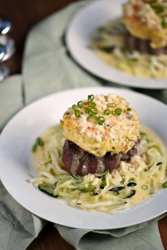 Crab Cake topped Filet Mignon on a bed of zucchini noodles