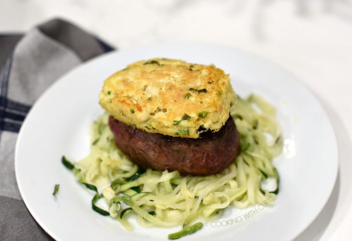 Crab Cake topped Filet Mignon on a bed of zucchini noodles