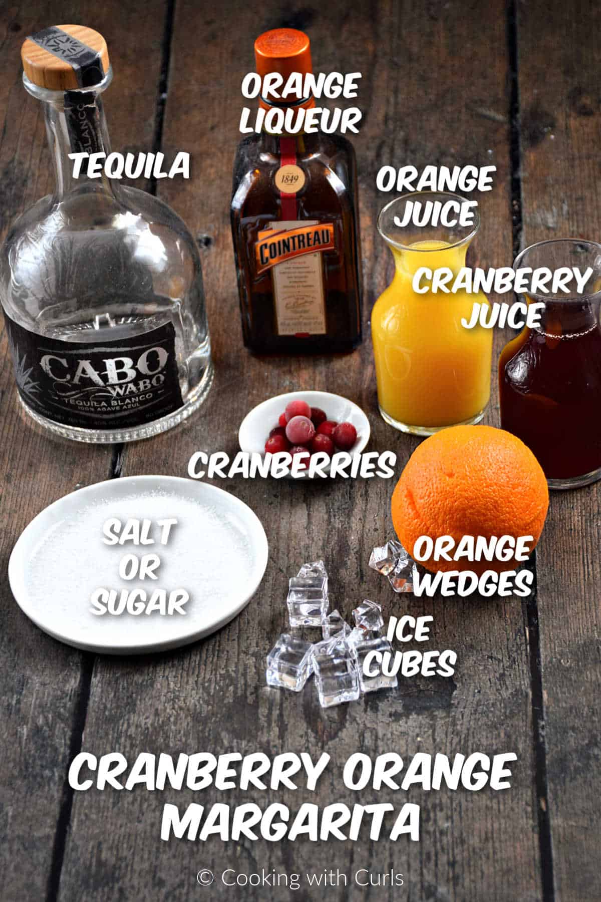 Ingredients needed to make a cranberry orange margarita.