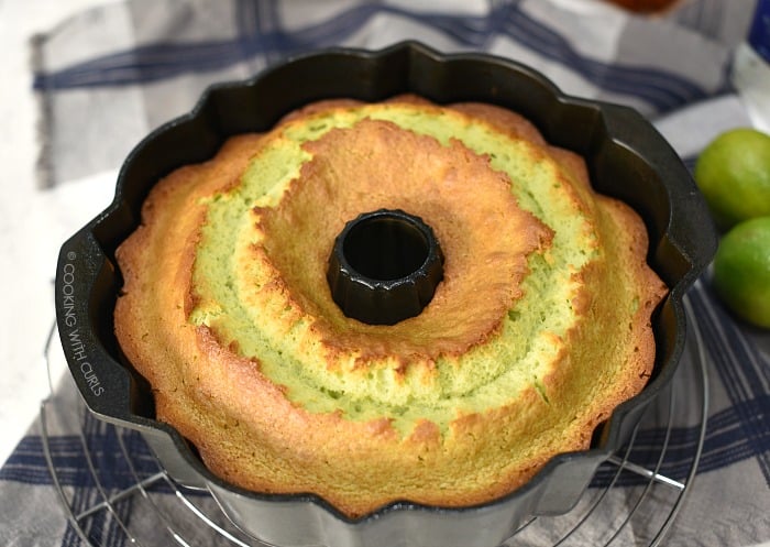 Baked Margarita Bundt Cake in the pan cooling on a wire rack. 