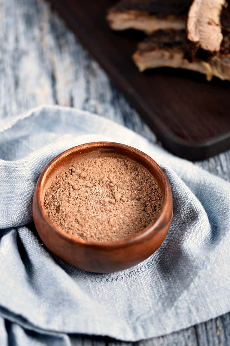 Cafe Mocha Dry Rub in a small wooden bowl wrapped in a blue napkin.