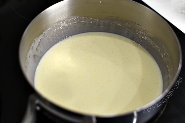 Butter and cream simmering in a saucepan. 