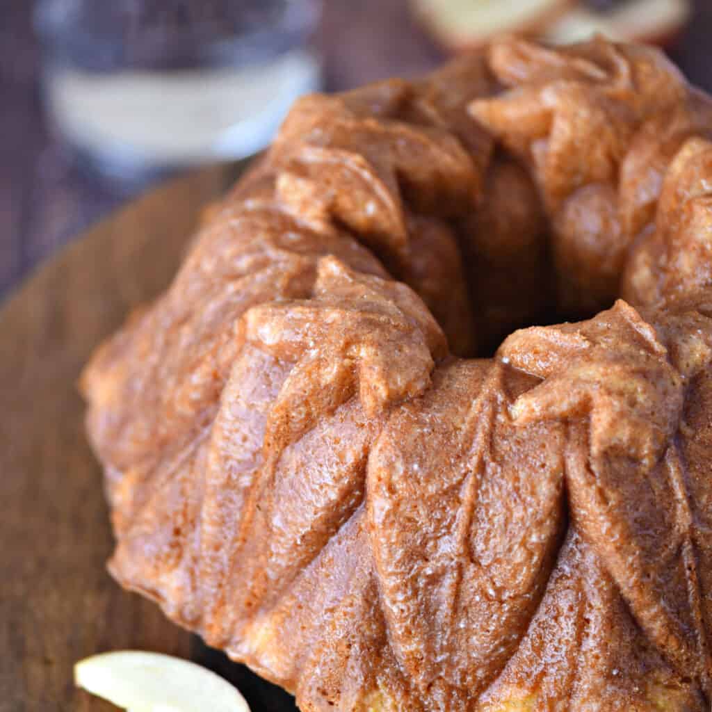 Appletini Cocktail Cake baked in a fall leaves bundt pan.