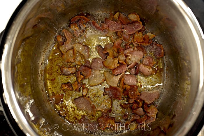 Sautéed bacon pieces in the instant pot liner. 