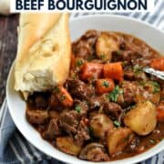 Instant Pot Beef Bourguignon in a bowl with title graphic across the top.