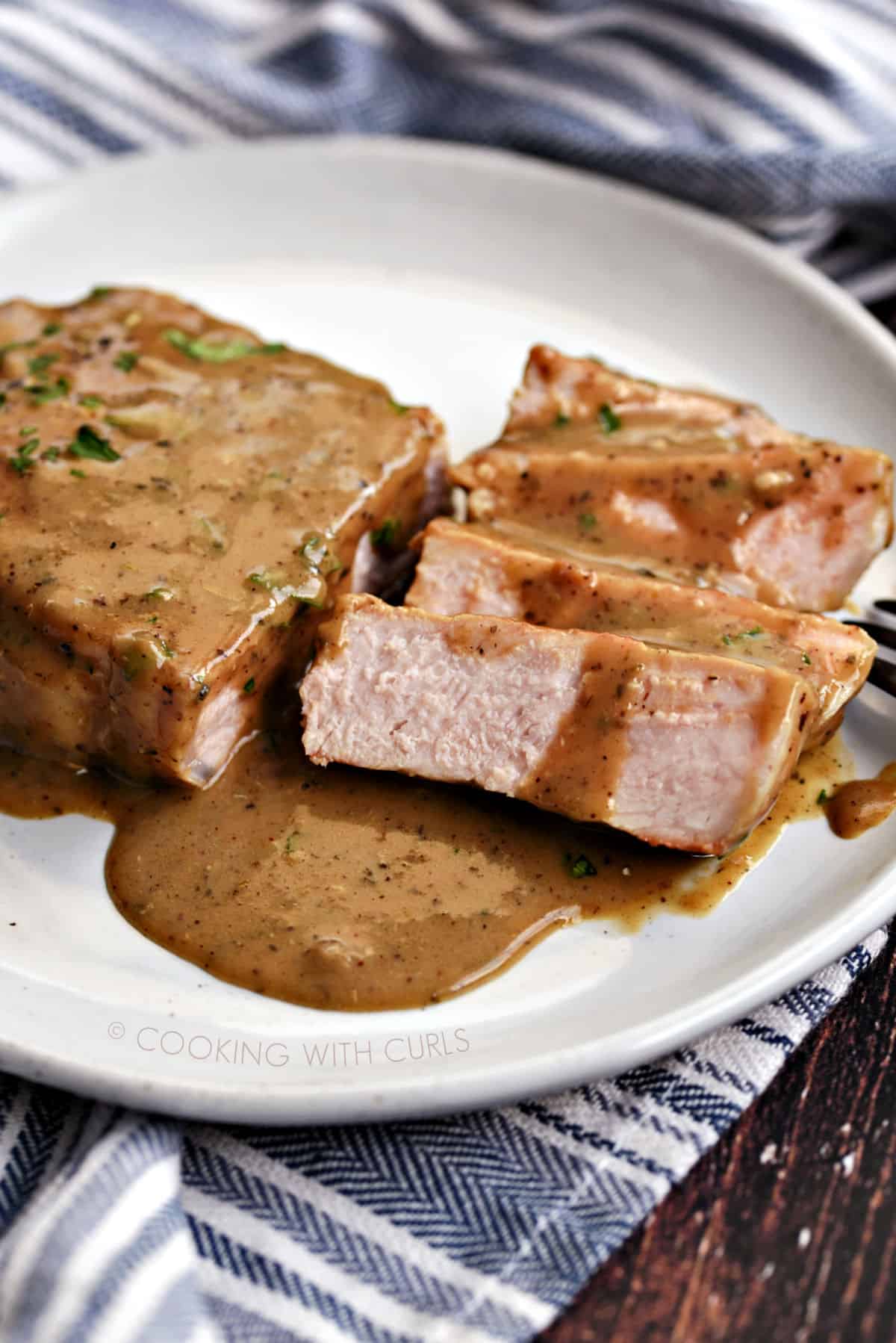 Tender and delicious Pork Chops with Pan Gravy. 