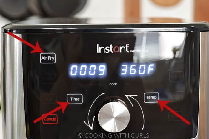 Air Fryer display with arrows to Air Fry, Time, Temp and the knob to adjust them. 