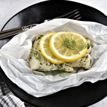 Baked Lemon-Dill Cod in Parchment Paper.