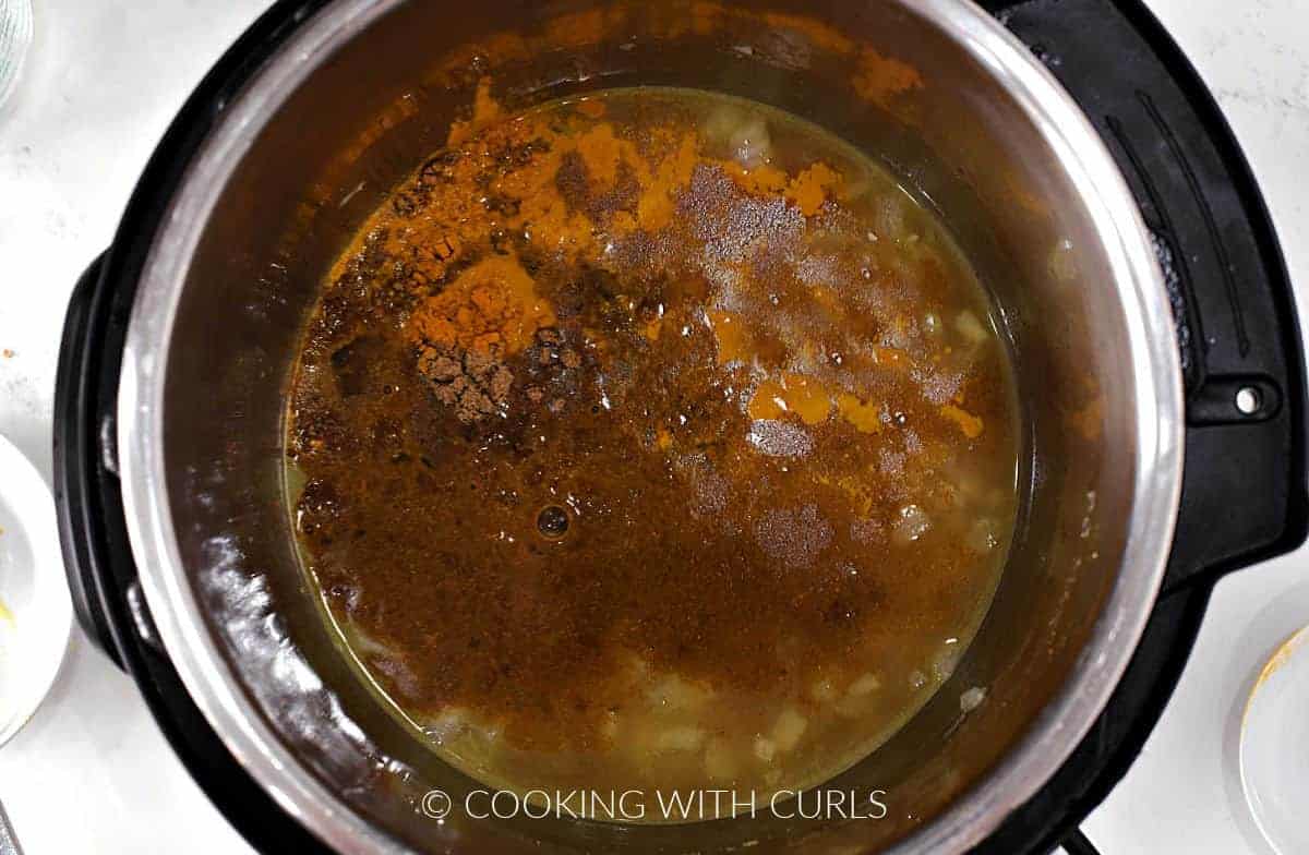 Spices added to the pressure cooker mixture. 