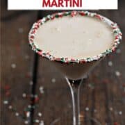 Christmas Cookie Martini in a glass rimmed with holiday sprinkles with title graphic across the top.