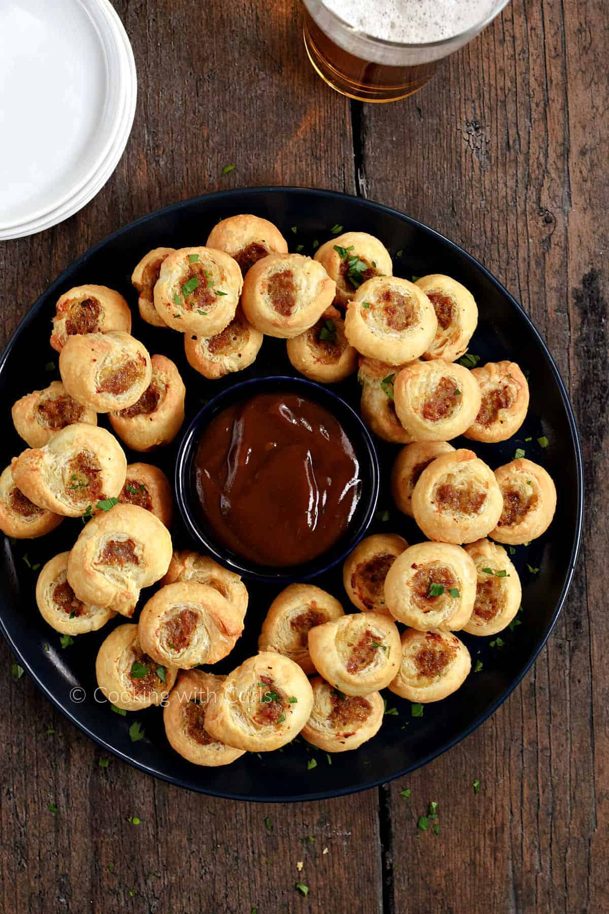 Looking down on a platter with stacks of Puff Pastry Sausage Bites. 