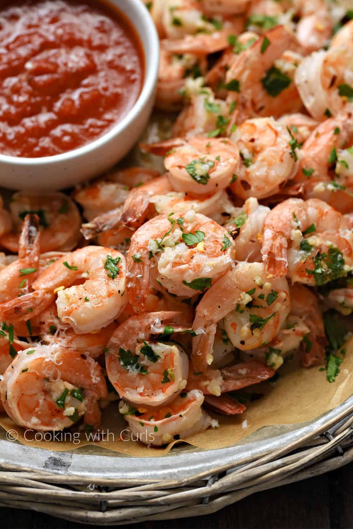Oven Baked Shrimp with a side of marinara sauce.