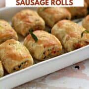 Bruschetta Chicken Sausage Rolls with puff pastry on a serving tray with title graphic across the top.