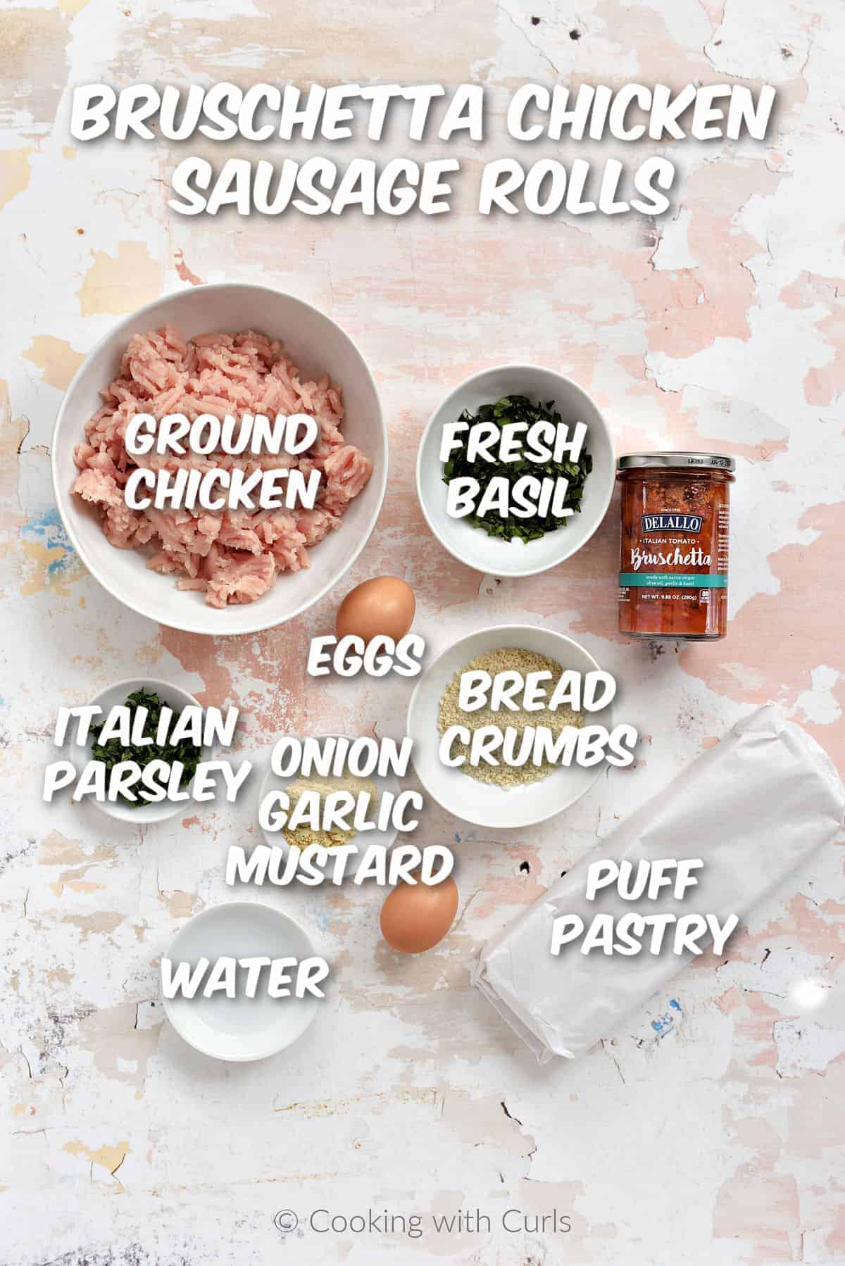 Ingredients to make bruschetta chicken sausage rolls.