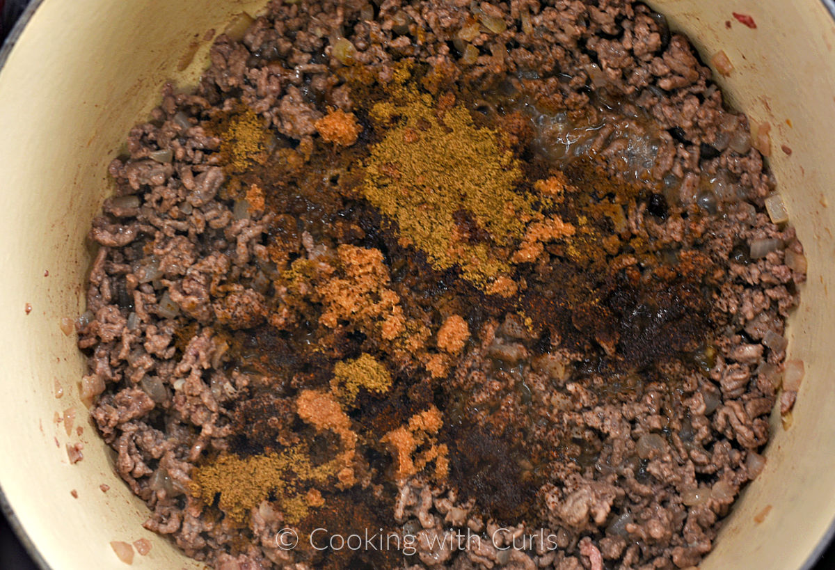 Seasonings added to the ground beef mixture. 