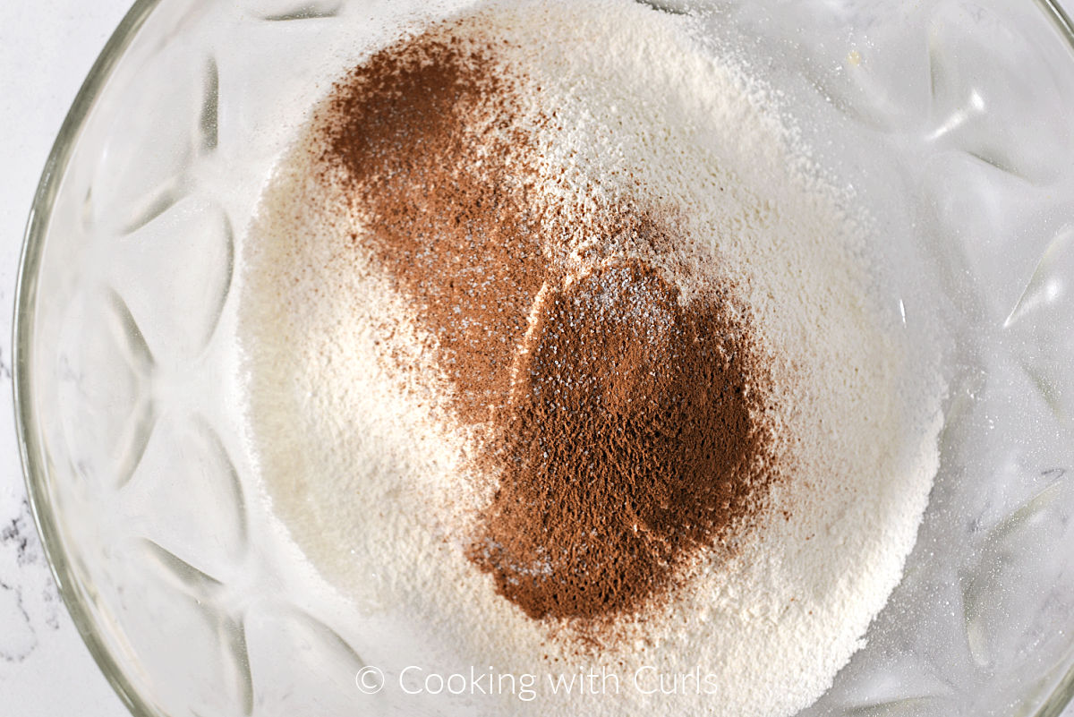 Flour, sugar and cinnamon sifted into a large bowl. 