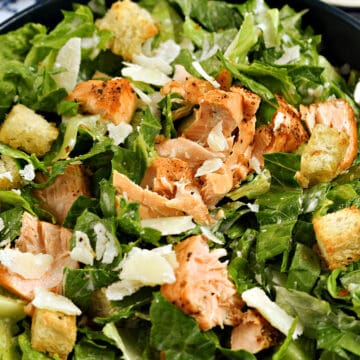 Chopped salmon on top of romaine lettuce, croutons, shaved parmesan and Caesar dressing.
