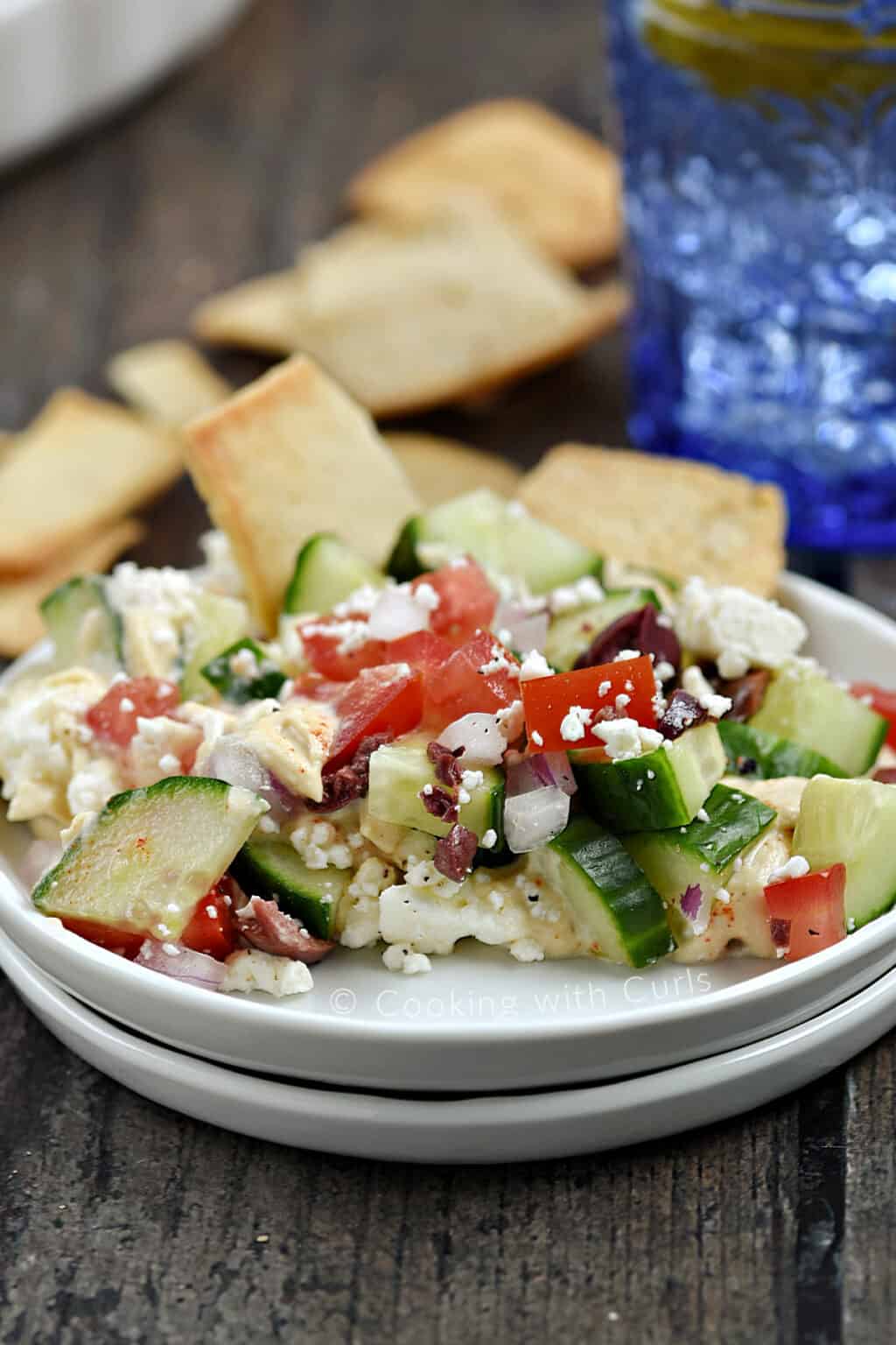 Layered Greek Dip Cooking with Curls