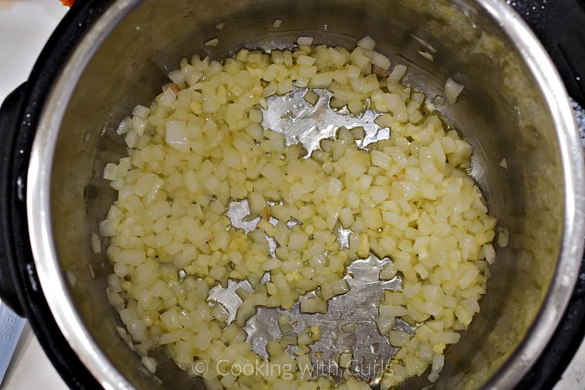 Sautéed, chopped onion in a pressure cooker. 