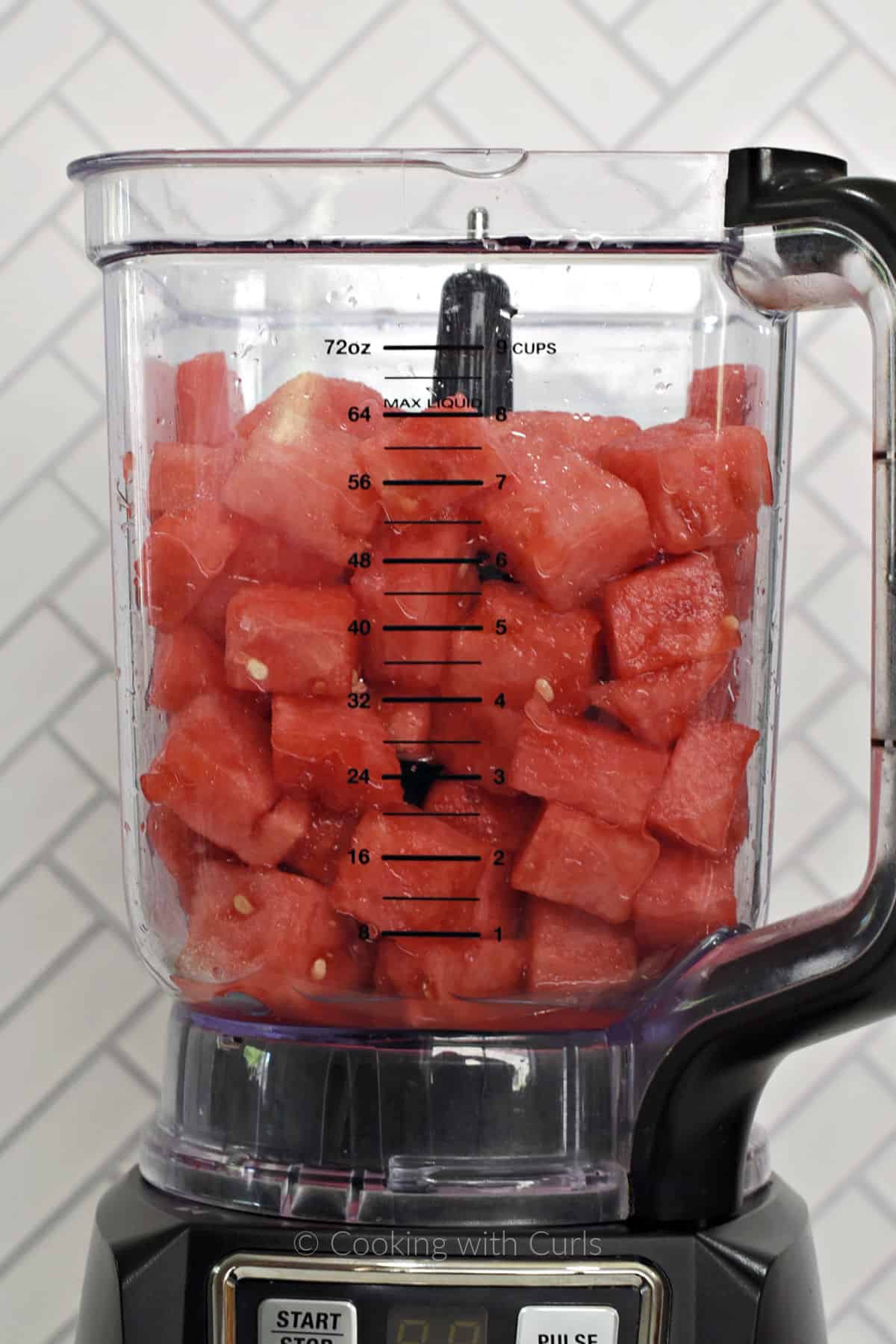 Watermelon chunks in a blender. 