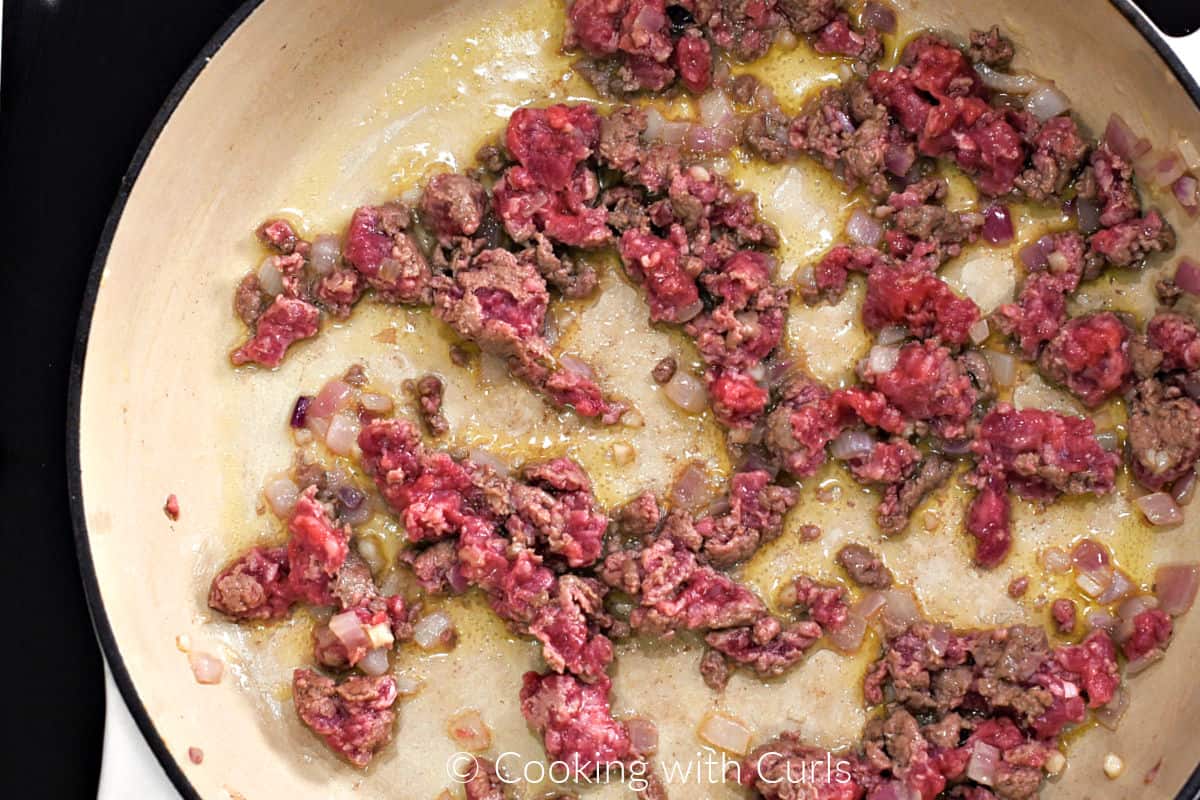Ground lamb, onion, and oil in a large skillet. 
