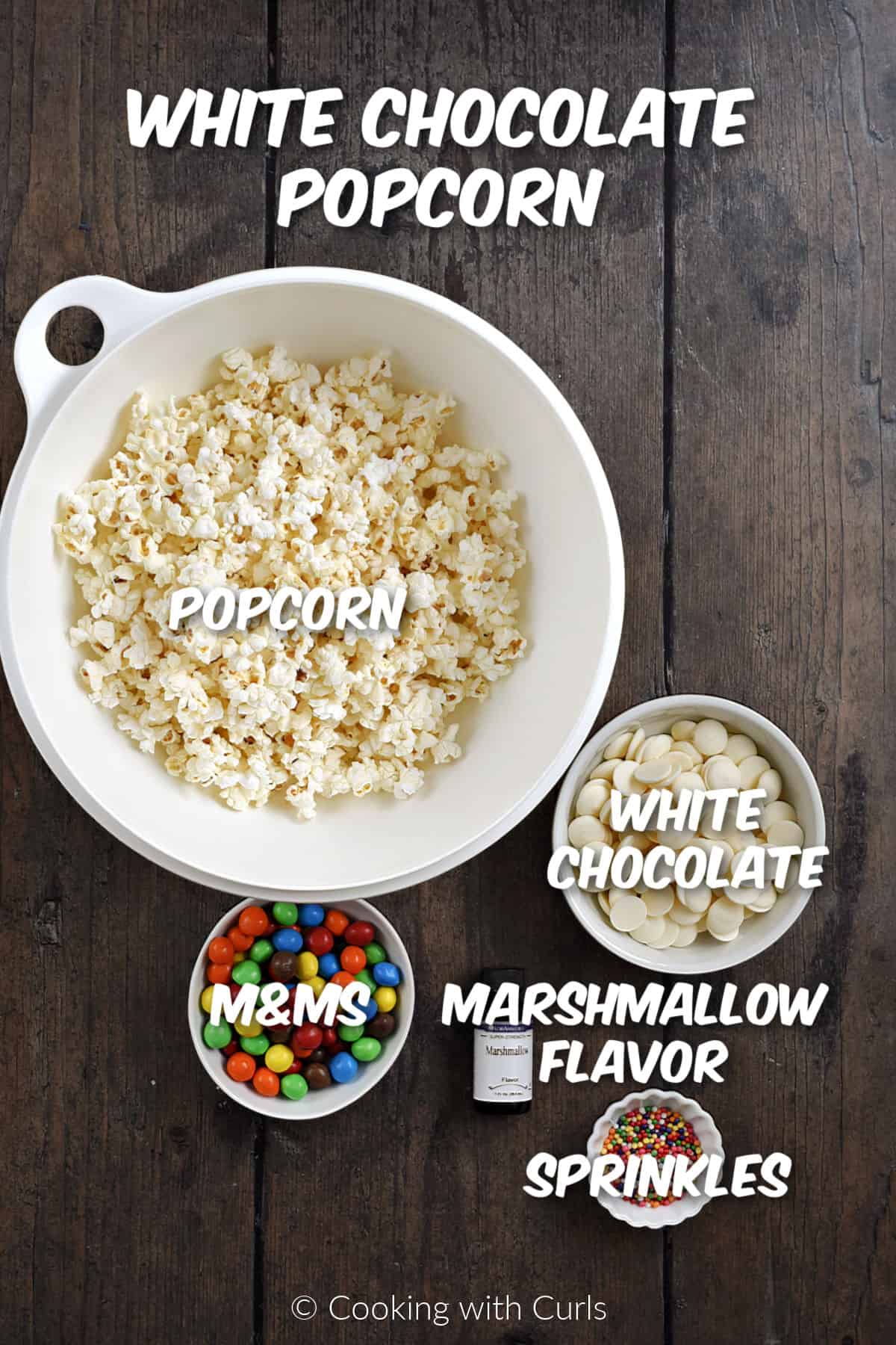 Ingredients needed to make White Chocolate Popcorn with marshmallow flavor, sprinkles, and m and ms. 