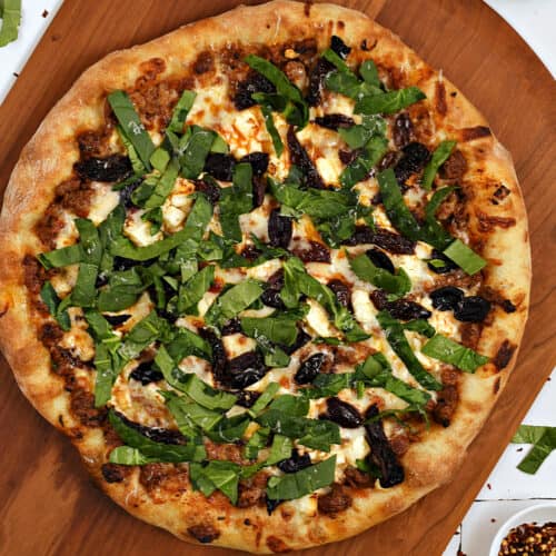 Mediterranean Lamb Pizza Cooking with Curls