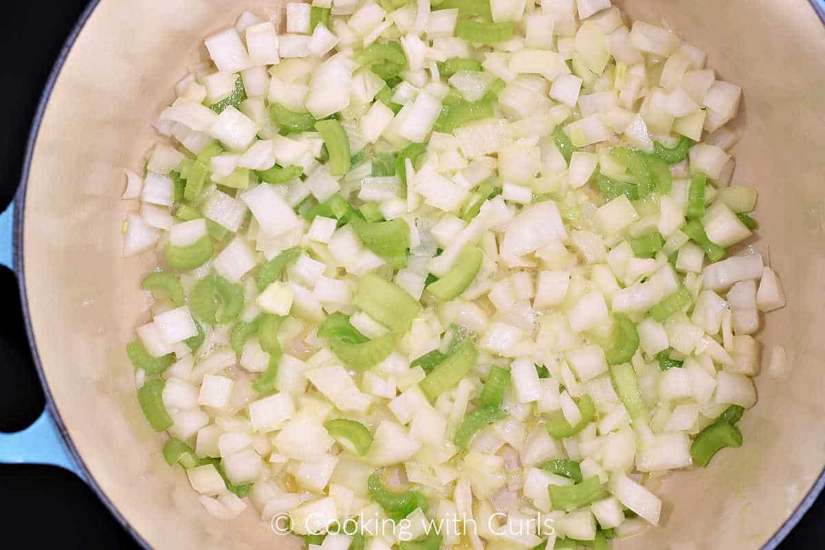 Diced-onions-and-celery-in-Dutch-oven.
