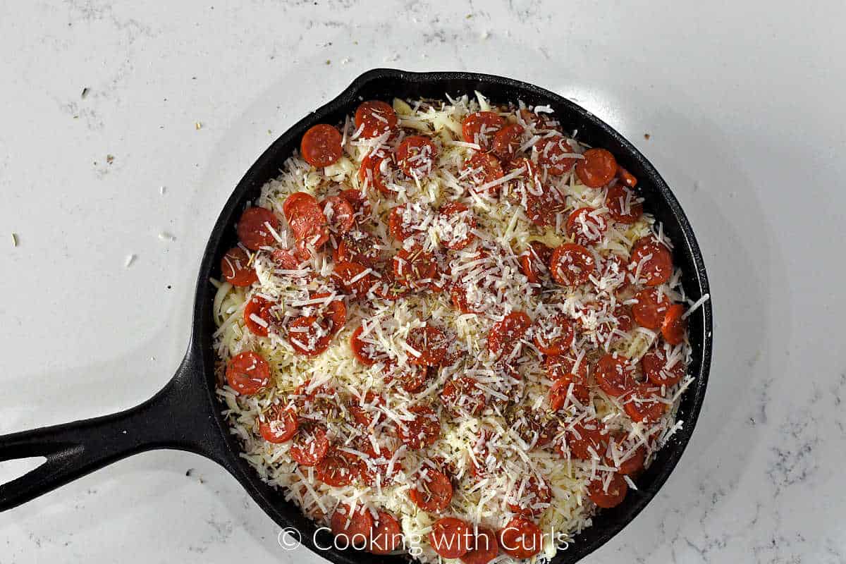 parmesan-covered-mini-pepperoni-in-a-cast-iron-skillet.