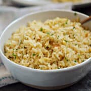 A bowl of rice pilaf with orzo pasta.
