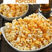 Two bowls of overflowing cheddar cheese popcorn with title graphic across the top.