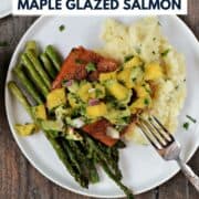 Salmon filet topped with mango avocado salsa on a bed of mashed potatoes and asparagus spears with title graphic across the top.