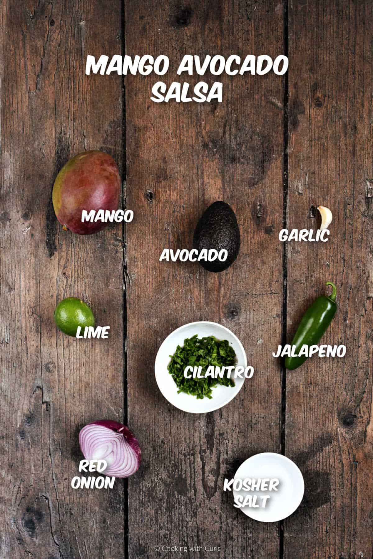 Ingredients needed to make mango avocado salsa.