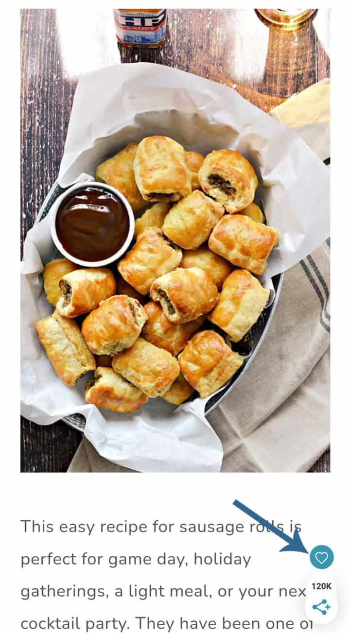 Image of a basket of puff pastry sausage rolls with a blue arrow pointing towards the grow.me button to sign up.