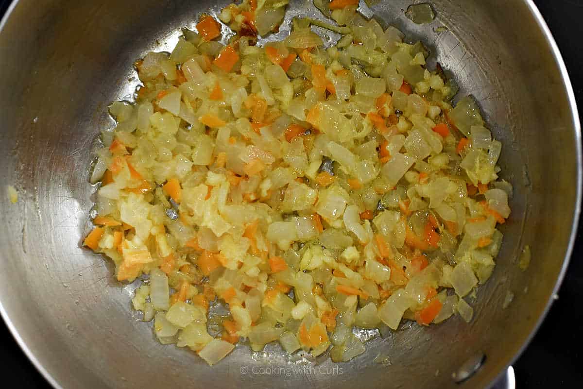 Diced onion, habanero, and garlic in saucepan.