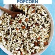 A large bowl of popcorn mixed with seaweed and sesame seasoning and rice crackers with title graphic across the top.