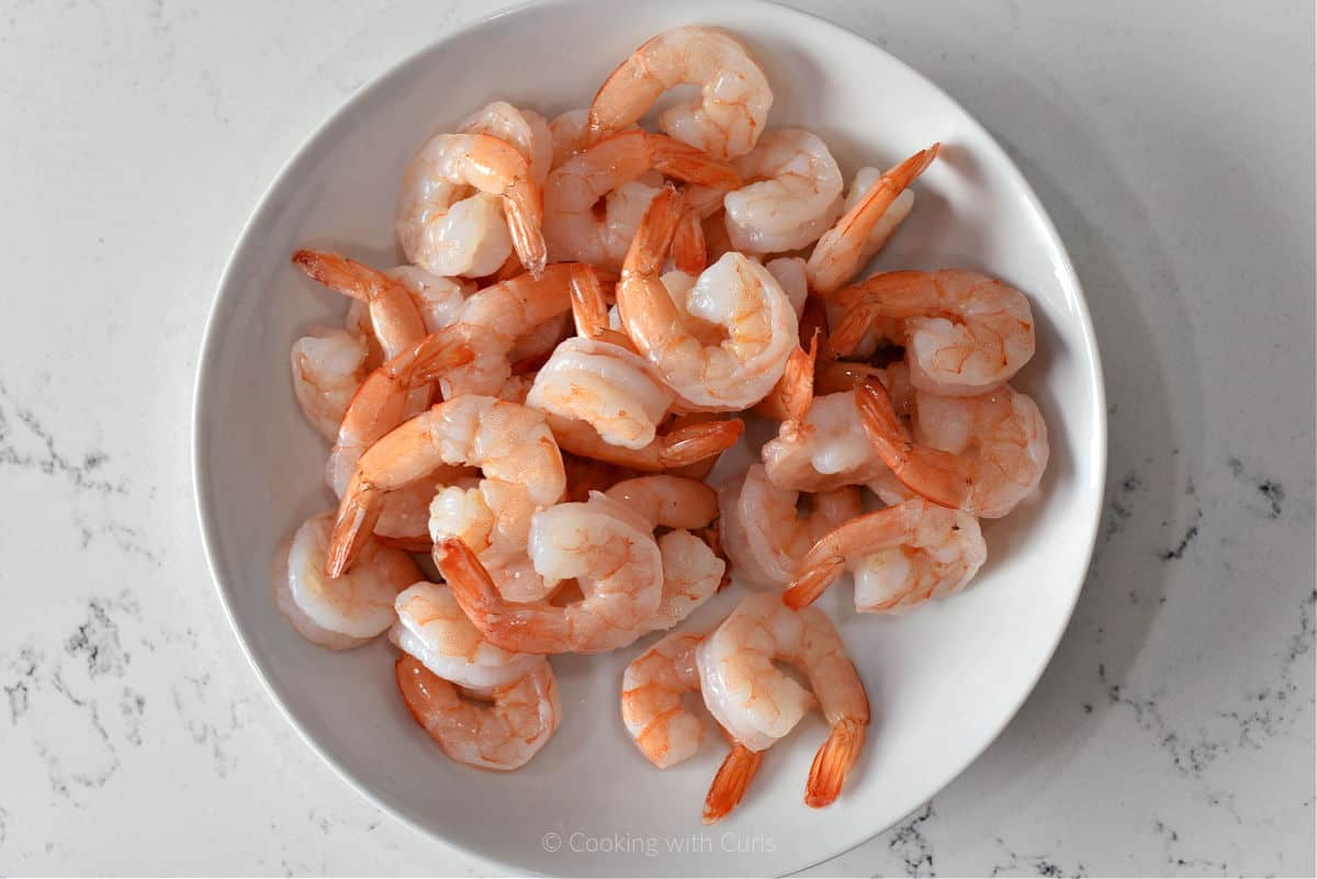 Cooked shrimp in bowl.