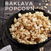 Golden baklava popcorn in a bowl with title graphic across the top.