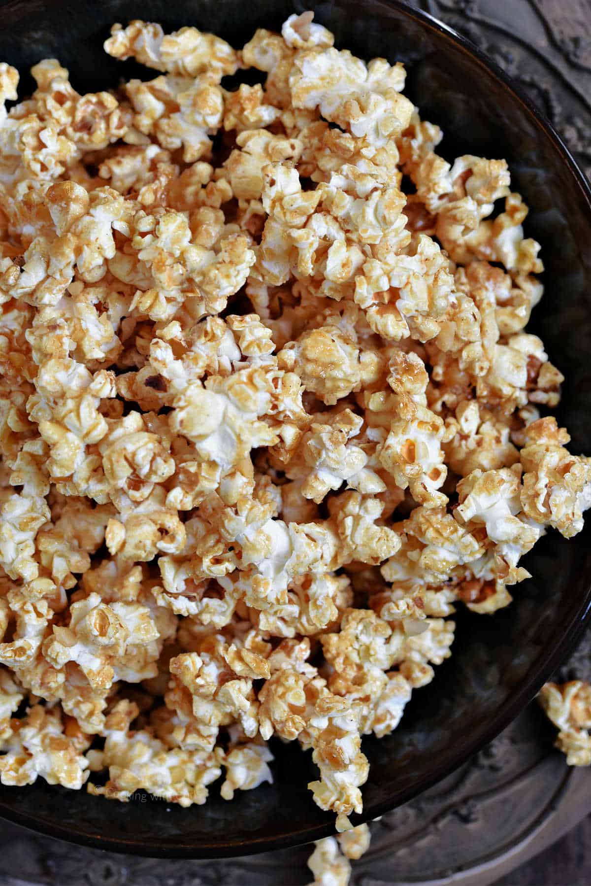 An overflowing bowl of baklava popcorn .