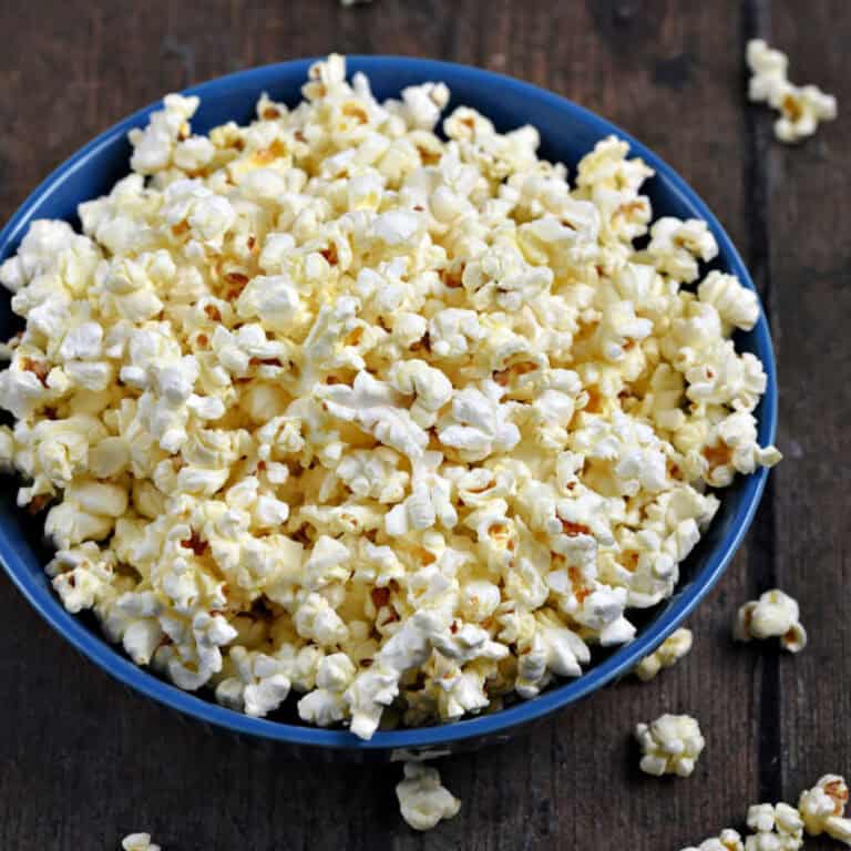 A bowl of freshly popped popcorn.